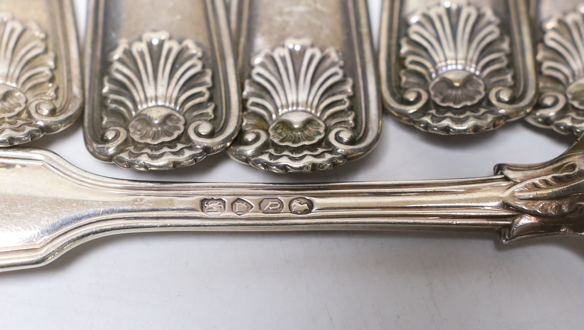 A set of eight Victorian silver fiddle, thread and shell pattern table forks, by George Adams, London, 1859, 20.3cm, 25.8oz.